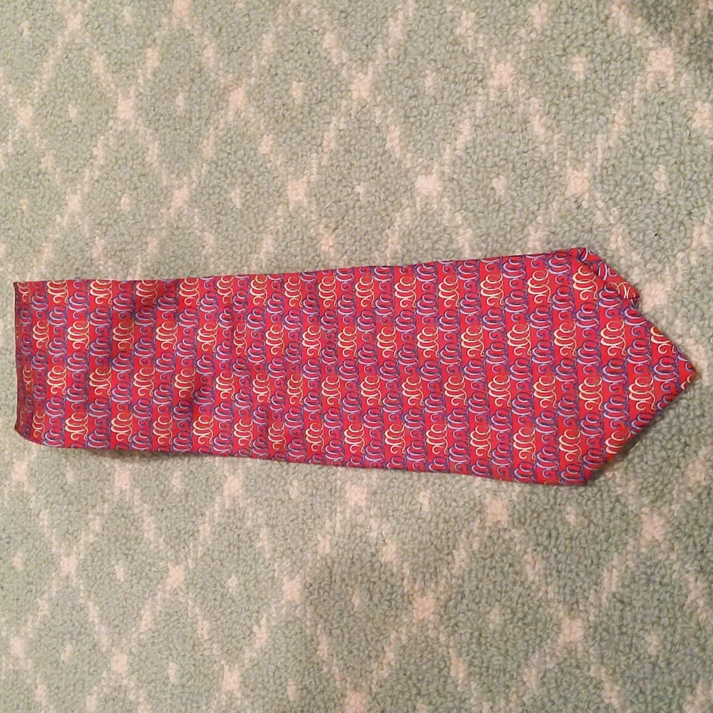 Salvatore Ferragamo red silk tie.